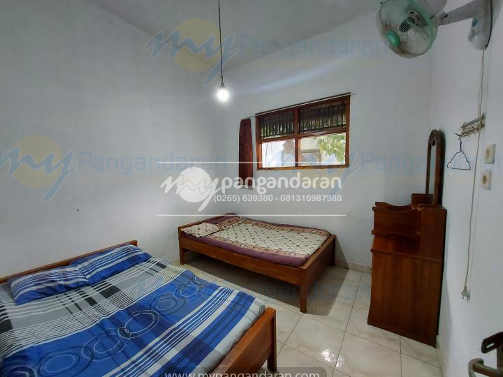    Tampilan Kamar Tidur Pondok Mas Dori Pangandaran<br />
Di lengkapi dengan kipas angin dan double bed ukuran 120x200
